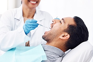 Male patient undergoing dental checkup