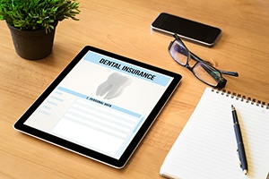 Dental insurance and notepad
